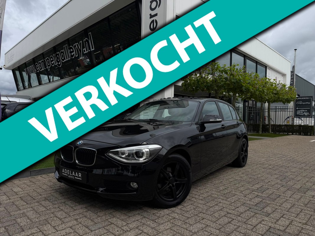 BMW-1 Serie-116i l PANORAMADAK l XENON l CLIMATRONIC l PDC l NAVI | Lease One en Lenen op Maat maken het mogelijk! BMW-1 Serie-116i l PANORAMADAK l XENON l CLIMATRONIC l PDC l NAVI | Lease One en Lenen op Maat maken het mogelijk!