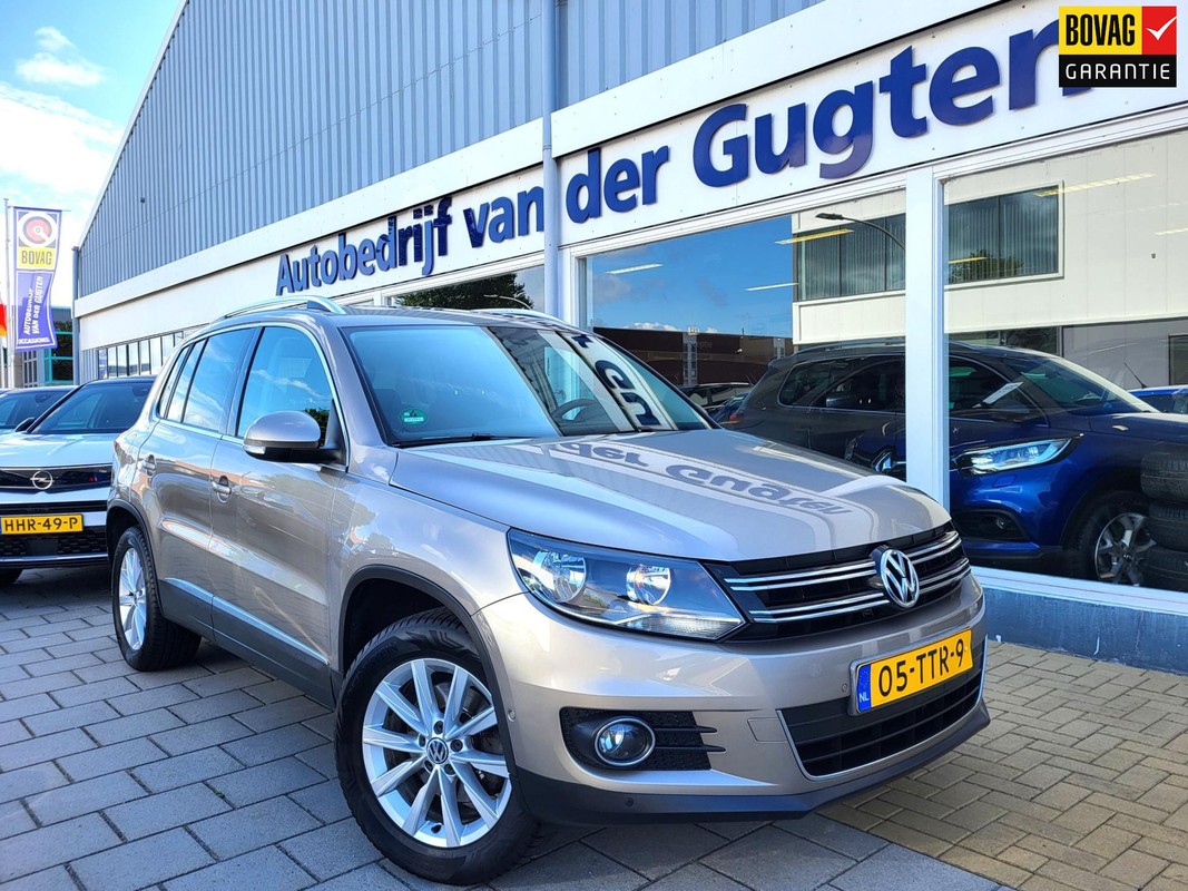 Volkswagen-Tiguan-1.4 TSI Sport&Style / Panodak / Airco / Cruisecontrol / | Lease One en Lenen op Maat maken het mogelijk!