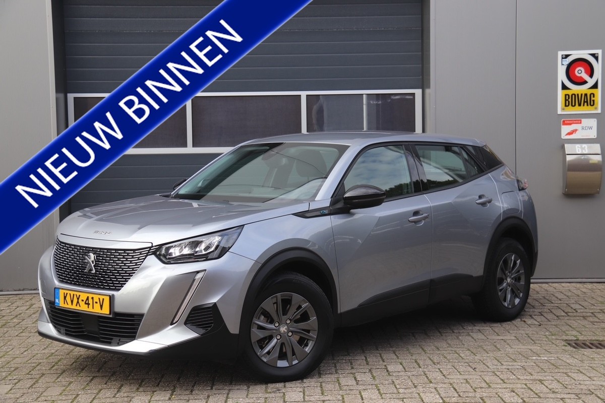 Peugeot-e-2008-EV Active Pack 50 kWh, Carplay, Camera, Cruise, SOH 90,63% | Lease One en Lenen op Maat maken het mogelijk!
