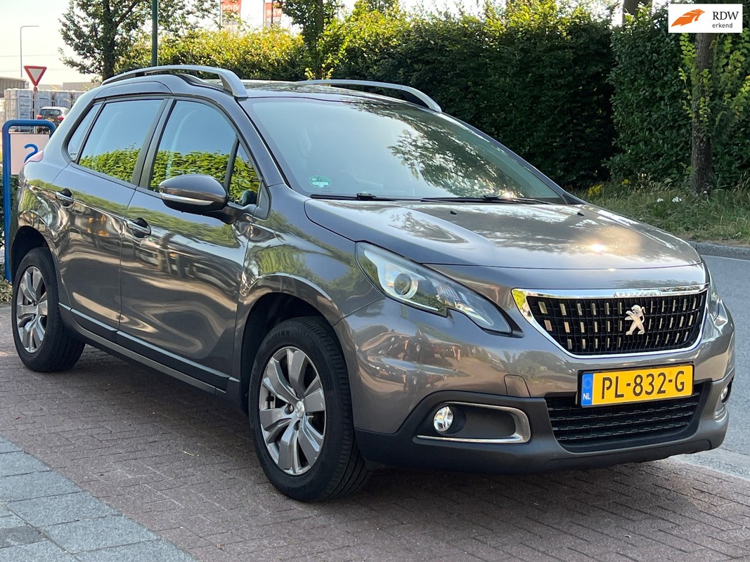 Peugeot-2008-1.2 P-Tech Blue *AUTOMAAT|PANO|NAVI | Lease One en Lenen op Maat maken het mogelijk!