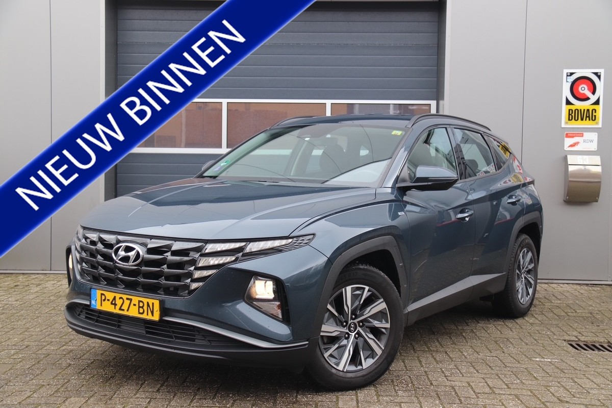 Hyundai-Tucson-1.6 T-GDI MHEV i-Motion, Camera, Cruise | Lease One en Lenen op Maat maken het mogelijk!