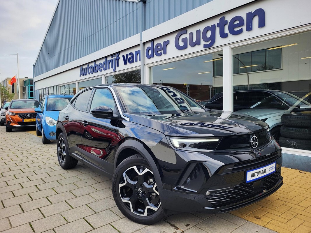 Opel-Mokka-1.2 Turbo Ultimate / Carplay & Android / Camera / 13.000 Km / Stoel -en Stuurverwarming / | Lease One en Lenen op Maat maken het mogelijk!