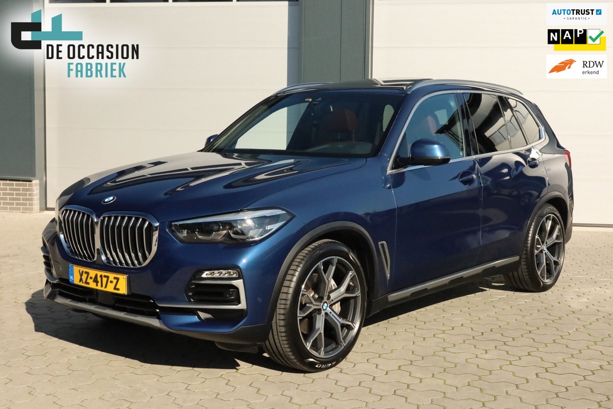 BMW-X5-XDrive40i High Executive Luchtvering 4-wielsturing Pano Trekhaak Carplay Harman Kardon | Lease One en Lenen op Maat maken het mogelijk! BMW-X5-XDrive40i High Executive Luchtvering 4-wielsturing Pano Trekhaak Carplay Harman Kardon | Lease One en Lenen op Maat maken het mogelijk!