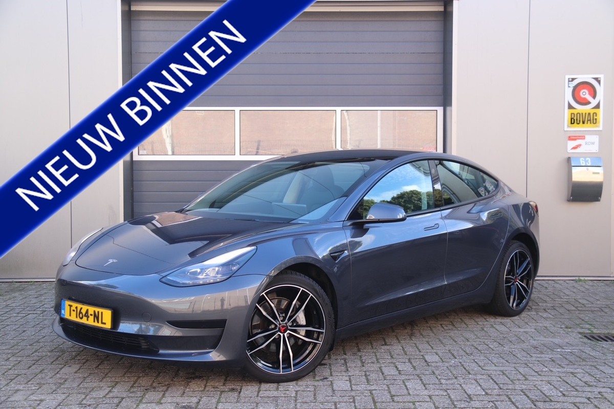 Tesla-Model 3-Standard RWD Plus 60 kWh, Stoel & Stuurverwarmd, Camera, Trekhaak, Pano, Navi | Lease One en Lenen op Maat maken het mogelijk! Tesla-Model 3-Standard RWD Plus 60 kWh, Stoel & Stuurverwarmd, Camera, Trekhaak, Pano, Navi | Lease One en Lenen op Maat maken het mogelijk!