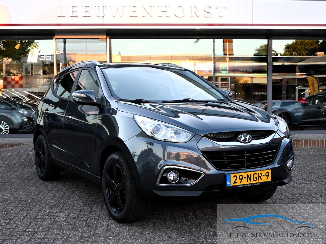 Hyundai-ix35-2.0i Style, clima, cruise, half leer, navi, trekhaak 1.900 kg. NL-auto | Lease One en Lenen op Maat maken het mogelijk!