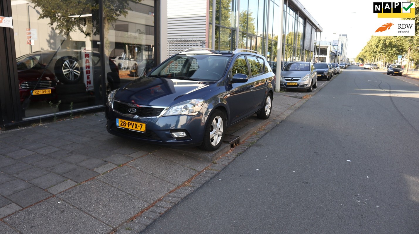 Kia-cee'd-Sporty Wagon 1.4 CVVT Seven 1e EIGENAAR / DEALER ONDERHOUDEN | Lease One en Lenen op Maat maken het mogelijk! Kia-cee'd-Sporty Wagon 1.4 CVVT Seven 1e EIGENAAR / DEALER ONDERHOUDEN | Lease One en Lenen op Maat maken het mogelijk!