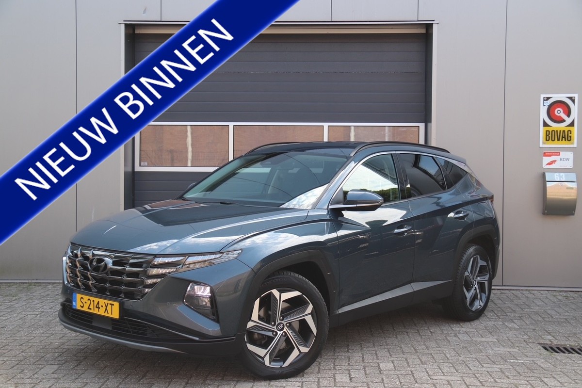Hyundai-Tucson-1.6 T-GDI PHEV Comfort Smart 4WD, Stoel & Stuurverwarmd, Camera, Cruise, Navi, SOH 100% | Lease One en Lenen op Maat maken het mogelijk!