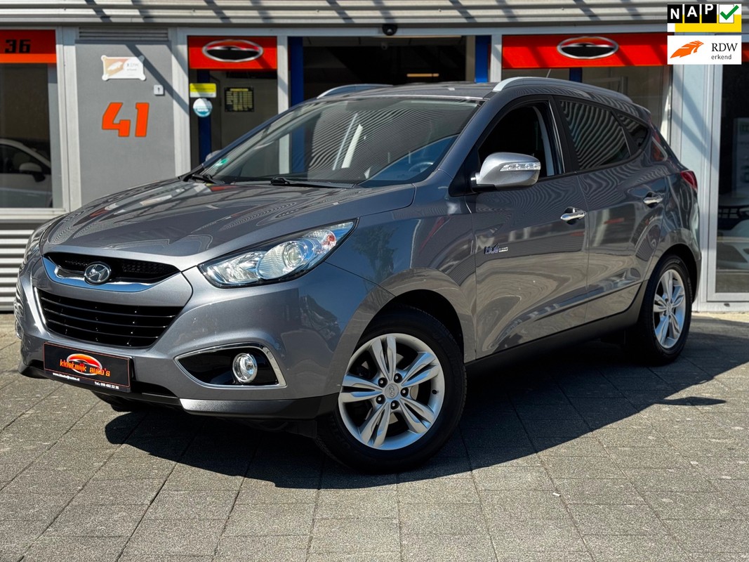 Hyundai-ix35-1.6i GDI i-Magine Navigatie Leder CarPlay Dealer Historie NL-Geleverd | Lease One en Lenen op Maat maken het mogelijk!