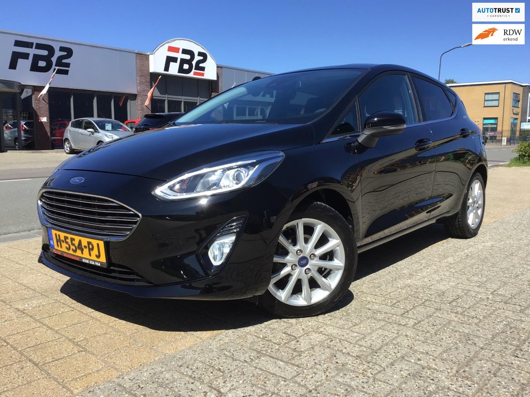 Ford-Fiesta-1.1 Trend I 2e Eigen I New Apk 2027 + Kln Brt I Remmen I Carplay I Airco I Cruise I Led I 98xxx I 16inch I Goed Onderh | Lease One en Lenen op Maat maken het mogelijk!