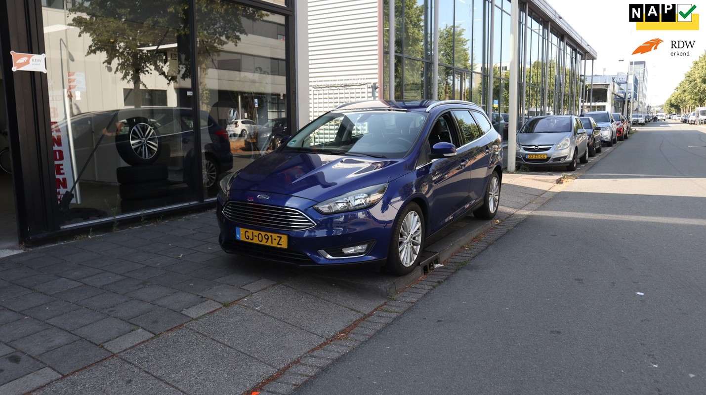 Ford-Focus-Wagon 1.0 Titanium Edition NW DISTR.RIEM / CRUISE CONTROL / NAVI | Lease One en Lenen op Maat maken het mogelijk! Ford-Focus-Wagon 1.0 Titanium Edition NW DISTR.RIEM / CRUISE CONTROL / NAVI | Lease One en Lenen op Maat maken het mogelijk!