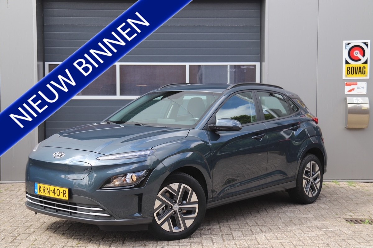 Hyundai-Kona-EV Comfort 39 kWh, Carplay, Camera, Cruise, SOH 100% | Lease One en Lenen op Maat maken het mogelijk!