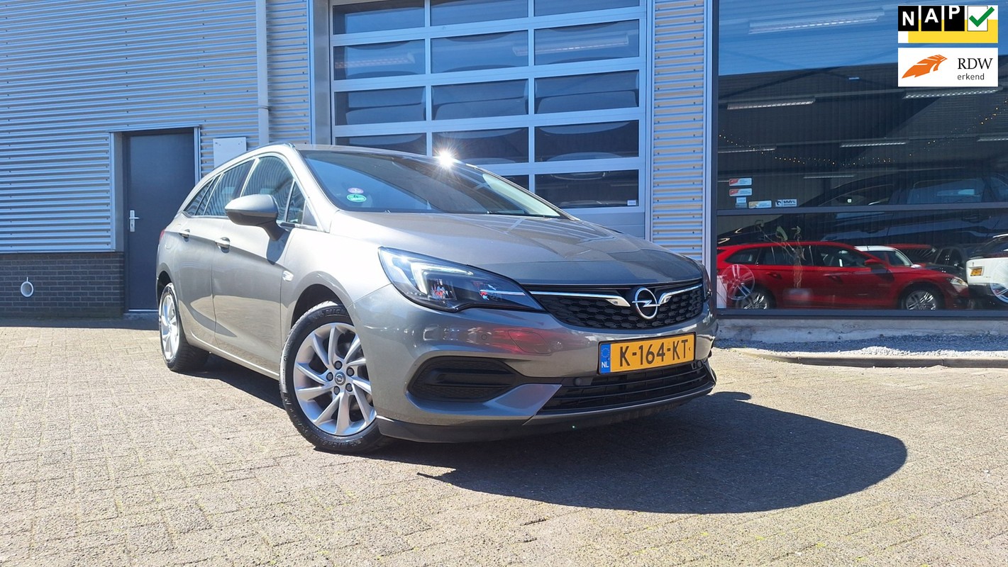Opel-Astra-Sports Tourer 1.2 Business Elegance/Trekhaak/Led/Camera/Pdc V/A/Enz | Lease One en Lenen op Maat maken het mogelijk! Opel-Astra-Sports Tourer 1.2 Business Elegance/Trekhaak/Led/Camera/Pdc V/A/Enz | Lease One en Lenen op Maat maken het mogelijk!